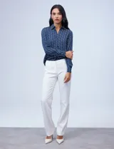 Pantalón de vestir negro, marca Zac & Rachel, con pretina con broches internos y cierre. Delantera y trasera con bolsillos.