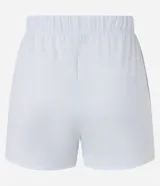 Short corto blanco de crepé con cintura elástica, cordón ajustable con punteras doradas y ruedo redondeado, diseñado como salida de playa por Bossa Nossa.