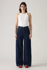 Jean de corte baggy con tiro medio y pierna ancha, confeccionado en denim de color azul oscuro sin elasticidad.
