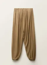 Mono largo de corte recto y diseño palabra de honor, con escote fruncido y bajo abullonado. Confeccionado en tejido mezcla de lana y viscosa.