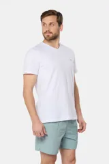 Short de baño negro liso, con cintura elástica y cordón regulable, dos bolsillos laterales y suspensor de malla fina.