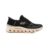 Championes deportivos Skechers modelo Slip-Ins Glide Step Pro, color negro con entresuela en tono rosado claro y detalles metálicos. Confeccionados en malla transpirable con tecnología Slip-Ins y suela con amortiguación.