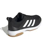 Championes deportivos Adidas Ligra 7, color negro con las tres tiras características en blanco. Presentan una suela de goma color caramelo con tecnología Adiwear para mayor durabilidad y tracción en superficies de interior.