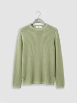 Sweater de tejido calado de algodón color verde, con cuello redondo y manga larga.