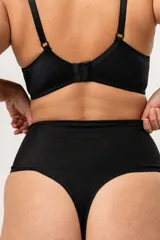 Colaless de tiro alto color piel, confeccionada en lycra con faja abdominal de lycra reforzada y contención media.