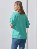 Blusa verde agua de algodón texturado, marca Ruby Rd, de manga corta con terminación amplia.