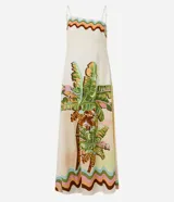 Vestido midi de viscolino con escote asimétrico y breteles finos ajustables. Presenta un diseño fluido con estampa tropical que incluye palmeras y un koala, rematado con un borde ondulado multicolor en el ruedo y el escote.