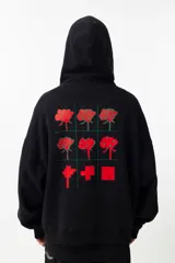 Buzo hoodie negro de algodón y poliéster con fit oversize. Estampa en la espalda con diseño de rosas pixeladas.
