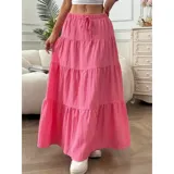 Falda larga de tiro alto con diseño acampanado y estructura de volados horizontales. Presenta cintura elástica con lazo ajustable y una textura sutilmente rayada.