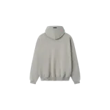 Hoodie de corte oversize en color gris claro, con capucha y bolsillo canguro. Presenta un estampado frontal en azul marino con el texto "USA" y "ESSENTIALS" debajo.