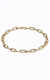 Collar dorado de eslabones anchos con acabado pulido y cierre ajustable.