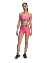 Short deportivo ajustado Under Armour, color fucsia, con cintura elástica visible con logo de la marca y costuras planas ergonómicas.