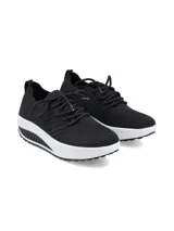 Championes urbanos Hush Puppies modelo Amaze, color negro con suela blanca de plataforma. Confeccionados con capellada de tejido flyknit transpirable y plantilla con tecnología memory foam para mayor amortiguación.