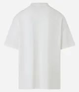 Remera blanca de algodón, corte oversized, manga corta y cuello redondo. Estampado frontal con la imagen de un rostro y la frase "Never Out O' Tune".