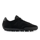 Championes New Balance modelo Gator Run, color negro, con perfil bajo, parte superior de textura texturizada, logo N en el lateral y suela dentada de goma.