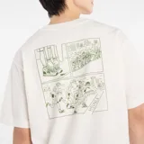 Remera blanca de algodón con cuello redondo y mangas cortas. Estampado frontal con la frase "Runners aren't normal." en color verde.