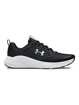 Championes de entrenamiento Under Armour modelo Charged Commit TR 4, color negro con entresuela blanca. Presentan parte superior de malla ligera con detalles texturizados, plantilla Deluxe Comfort System y mediasuela Charged Cushioning para mayor amortiguación y respuesta.
