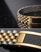 Pulsera de acero con baño de oro, compuesta por eslabones tipo reloj y una placa central con detalle de fibra de carbono.