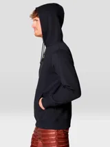 Buzo tipo canguro con capucha y bolsillo frontal, confeccionado en una mezcla de algodón. Presenta el logotipo de la marca Mountain Hardwear bordado en el centro del pecho.