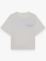 Camiseta de corte boxy y fit relajado, con cuello redondo y mangas cortas. Presenta una estampa minimalista en el frente y está confeccionada en tejido interlock de algodón.