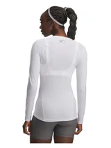 Remera de compresión de manga larga Under Armour, confeccionada en tejido HeatGear ultraligero y elástico, diseñado para absorber el sudor y secarse rápidamente. Presenta un ajuste al cuerpo con costuras planas ergonómicas para mayor comodidad y libertad de movimiento.