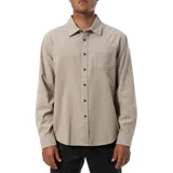 Camisa de pana color beige, de corte recto, manga larga y cuello clásico.