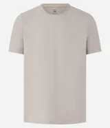 Remera de corte slim confeccionada en algodón acanalado, con cuello redondo y mangas cortas. Presenta un diseño básico y versátil con textura de rayas en relieve.