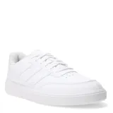 Championes Adidas Courtblock blancos de cuero sintético con las tres tiras laterales perforadas.