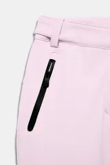 Pantalón de esquí rosa con corte flare, tiro alto, bolsillos frontales con cremallera y bajos con cremallera y aplicación de parche técnico.