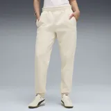 Pantalón de jogging Puma de corte holgado, color arena, con cintura elástica y puños acanalados en los tobillos. Presenta bolsillos laterales y el logo de la marca bordado en la pierna izquierda.