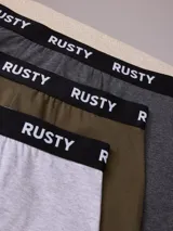 Pack de tres bóxers Rusty con cintura elástica y logo de la marca.