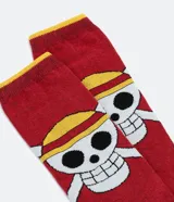 Medias de caña larga color bordó con estampado del logo de One Piece y la calavera de Monkey D. Luffy. Presentan puntera y borde superior en color amarillo, con talón en negro.