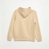 Buzo color beige con capucha y estampado frontal del número 89 en negro con borde blanco.