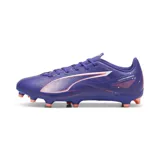 Championes de fútbol Puma modelo Ultra 5 Play FG/AG, color violeta con detalles en rosa y blanco. Diseñados para césped natural y artificial, cuentan con una estructura ligera y suela con tapones para mayor tracción.