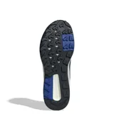 Championes de senderismo Adidas Terrex Anylander, color celeste con detalles en azul oscuro y negro. Presentan exterior textil con refuerzos sintéticos, mediasuela de EVA para amortiguación y suela Traxion para mayor agarre en terrenos irregulares.