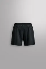 Short deportivo Zara Athleticz color marrón, de tejido técnico ligero y elástico con cintura elástica ajustable con cordón y detalles de bolsillos.