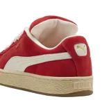Championes Puma Suede XL de gamuza en color azul, con franja lateral blanca y suela de goma blanca.