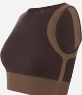 Top deportivo Get Over confeccionado en microfibra seamless de color marrón, con diseño ajustado, escote redondo, sin mangas y recortes contrastantes en tono tostado.
