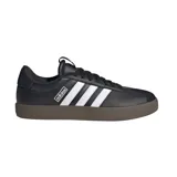 Championes Adidas VL Court 3.0 Low de estilo urbano, confeccionados en cuero sintético negro con las icónicas tres bandas laterales en blanco y suela de goma color marrón.
