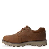 Zapatos de cuero color marrón con diseño casual, cordones al tono y suela de goma antideslizante en color beige.