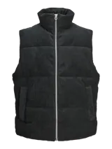 Chaleco acolchado negro de pana con cuello alto, cierre de cremallera y bolsillos frontales.