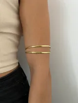 Brazalete doble dorado para el brazo, hecho a mano en bronce.