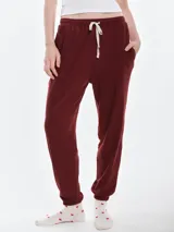 Pantalón de dormir de micro polar, con cintura elástica y cordón ajustable, bolsillos laterales y puños elásticos en los tobillos.