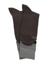 Medias de caña media confeccionadas en fibra de bambú, con diseño de rombos en la parte superior y logo bordado. Presentan una combinación de colores gris, marrón, blanco y burdeos.