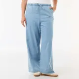 Pantalón vaquero de corte ancho, color azul claro, con cintura elástica y cordón ajustable.