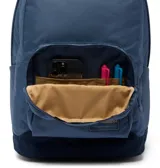 Mochila urbana Columbia de 30 litros, color azul oscuro con detalles en beige. Cuenta con dos compartimentos principales, funda acolchada para laptop, bolsillos laterales para botellas y base plana reforzada.
