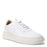 Championes urbanos Democrata modelo Eleko, color blanco con suela de plataforma en tono crema. Presentan un diseño de corte bajo con perforaciones en la puntera para mayor ventilación y el logo de la marca grabado en el lateral.