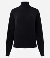 Suéter de punto color crema con cuello alto y mangas largas. Presenta un diseño ajustado al cuerpo con puños acanalados.
