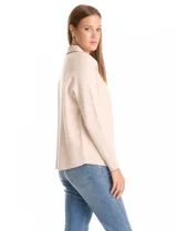 Sobrecamisa de mujer marca Sioni, con diseño combinado en tejido de punto y eco cuero. Presenta cuello camisero, cierre frontal con botones y mangas largas con puños tejidos.