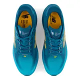 Championes de running New Balance Ellipse V1, color azul con suela de goma y logo N en gris con borde amarillo. Confeccionados con parte superior de malla técnica transpirable y entresuela Fresh Foam X.